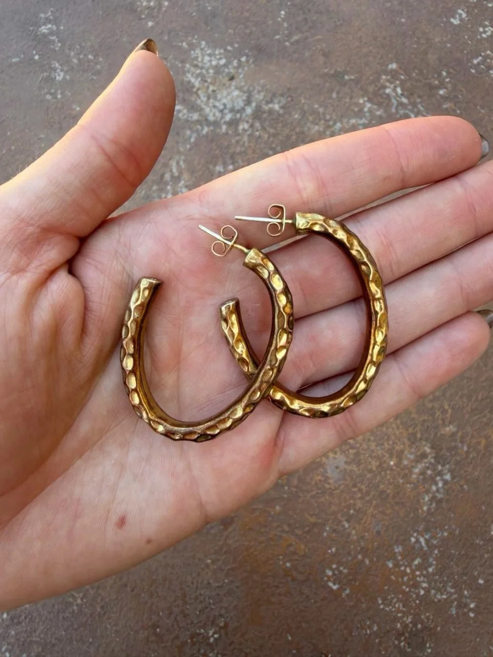 Gold sterling silver hoop statement earrings with a hammered texture #hoops